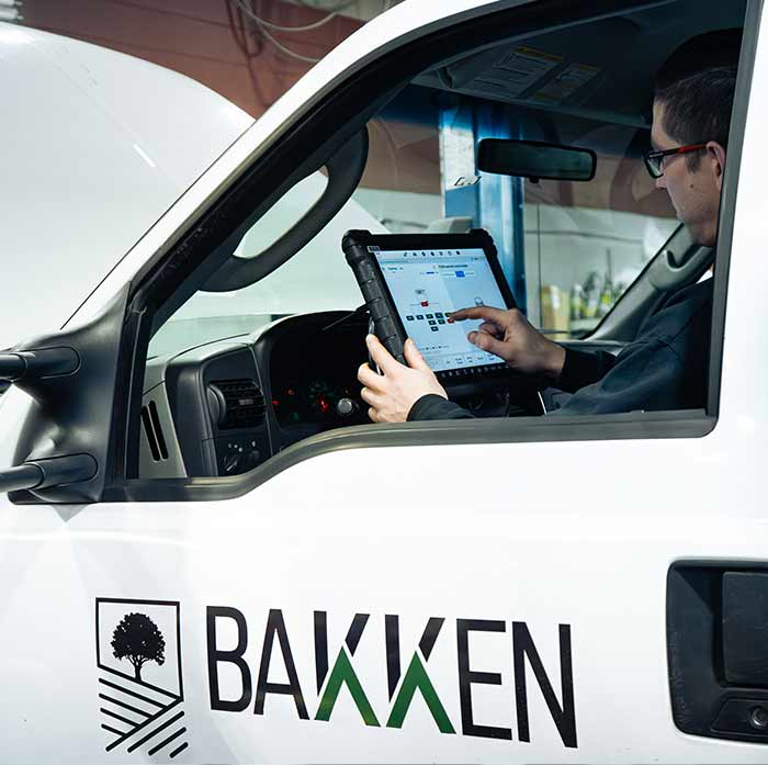 Technician running an electrical diagnostic scan